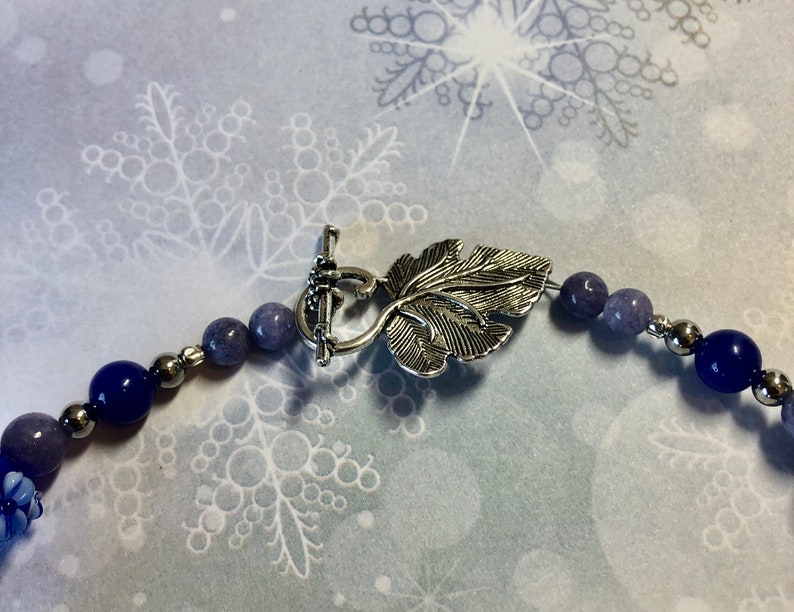 161/2 Choker made with stainless steel, lapis lazuli, torch fired beads. Cobalt blue and lavender tones. Metal leaf clasp image 6