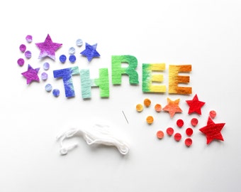 DIY Felt Third Birthday Garland, Rainbow Wool Felt Letters THREE, Stars, & Wood Bead Birthday Decoration Kit, Colorful Three Year Bday Party