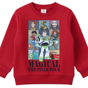 A red sweatshirt with a collage of characters from the Disney Pixar film "The Magical The P Pixar Tour" displayed on it.