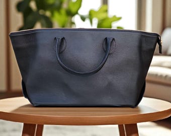 Pochette a busta in vera pelle: elegante borsa da sera realizzata a mano.