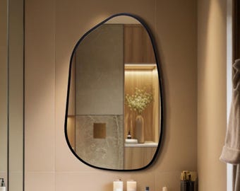 Espejo negro ondulado: un detalle de pared abstracto y único con encanto minimalista para pasillos, tocadores y hogares con estilo.