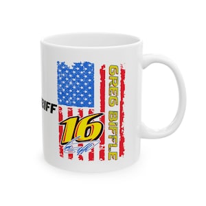 May include: White ceramic mug with an American flag design. The mug features the name "GREG BIFFLE" in yellow and the number "16" in yellow and red. Includes a signature.