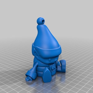 May include: A blue 3D-printed figurine of a seated elf wearing a pointed hat with a ball on top. The elf has a belt and boots, and is sitting with its legs extended.