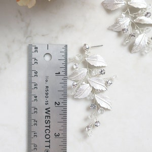 Measurements long dangling earrings with leaf design for boho bride.