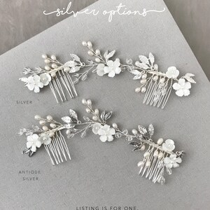 Bridal hair comb with flowers, leaves, pearls and crystals. Available in silver or antique silver.