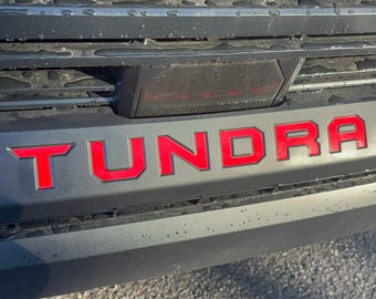 Decals Graphic Stripe for the Front Bumper of a 2022-25 Toyota Tundra. Installation Video and Customization Available.