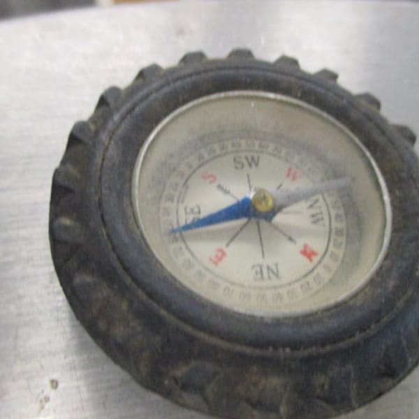Vintage Compass In Tractor Tire mid century adv collectible mancave boy scout toy game recreation decor