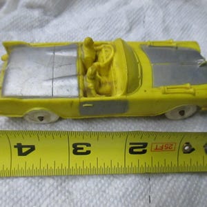 Vintage Auburn Rubber Co. CADILLAC CONVERTIBLE TOY Car yellow & silver in color mid century toy collectible memorabilia