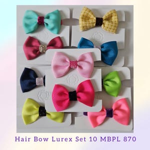 May include: A set of ten hair bows in various colours including teal, yellow, pink, blue, navy, lime green, and hot pink. Each bow features a textured ribbon design with a glittery centre accent, mounted on individual white display cards.