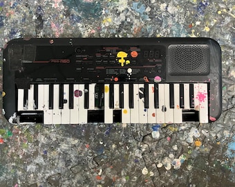 Signed by Mr Let's paint Used Yamaha PSS-A50
