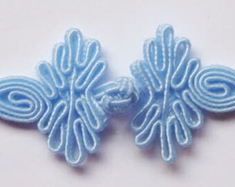 Six pairs light blue Chinese Frogs fasteners closure buttons