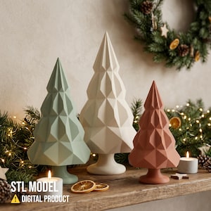 May include: Three geometric Christmas tree sculptures in sage green, cream, and terracotta. Each tree features a faceted, angular design and stands on a circular pedestal base. The text STL MODEL DIGITAL PRODUCT is visible in the lower left corner.