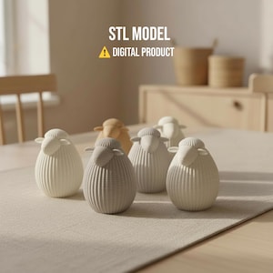 Puede incluir: Una colección de pequeñas figuras decorativas de ovejas en varios tonos de blanco y gris, dispuestas sobre una superficie clara. Las figuras tienen una textura acanalada y están diseñadas con formas simples y redondeadas. El texto "STL MODEL" y "DIGITAL PRODUCT" está presente.