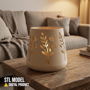 May include: A beige cylindrical candle holder with floral cutouts, sitting on a wooden table. The candle holder has a warm glow emanating from within. The text "STL MODEL" and "DIGITAL PRODUCT" are at the bottom.