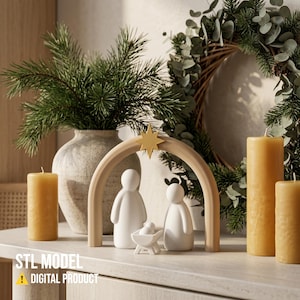 Pode incluir: Um conjunto de presépio branco com duas figuras estilizadas e uma pequena criança numa manjedoura sob um arco bege com uma estrela dourada no topo. O texto STL MODEL DIGITAL PRODUCT é visível no canto inferior esquerdo da imagem.