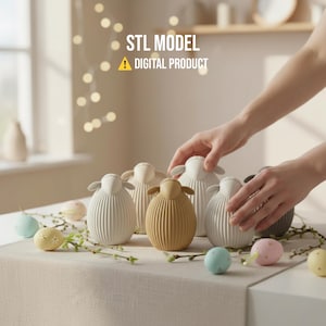 May include: A collection of decorative sheep figurines in various colors, including white and tan, arranged on a table with Easter eggs. The figurines have a ribbed design and are accompanied by the text "STL MODEL DIGITAL PRODUCT".