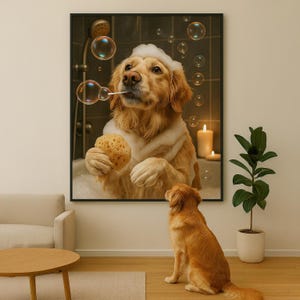 May include: A framed print shows a golden retriever in a bubble bath, holding a sponge and blowing bubbles. The dog is surrounded by foam and bubbles. Another dog sits below the print, gazing upwards. Candles provide soft lighting.