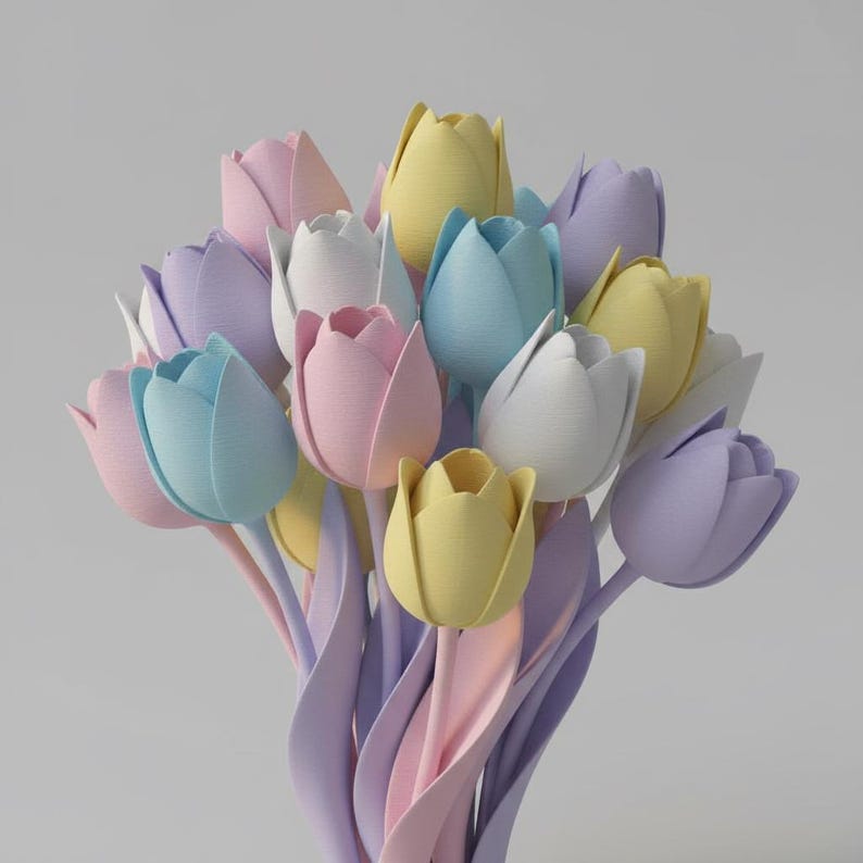 May include: A bouquet of pastel-colored tulips. The arrangement features tulips in shades of pink, yellow, blue, white, and purple. The stems and leaves are a soft lavender color, creating a delicate and cheerful display.