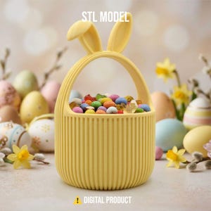 May include: A yellow bunny-shaped Easter basket filled with colourful sweets. The basket has a handle and ears, with vertical lines. The text "STL MODEL" and "DIGITAL PRODUCT" are visible. Easter eggs and flowers are in the background.