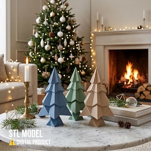 May include: Three geometric Christmas tree sculptures in blue, green, and beige, displayed on a marble table. The text "STL MODEL" and "DIGITAL PRODUCT" appears in the lower left corner. These decorative items feature a faceted, angular design.