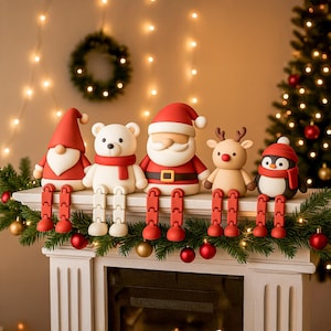 May include: A festive Christmas mantel display featuring five decorative figurines: a gnome, a polar bear, Santa Claus, a reindeer, and a penguin. Each figure has red legs and is perched above a fireplace decorated with garland and ornaments.