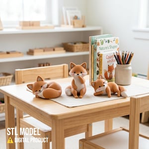 May include: Three small fox figurines in orange and white with pink cheeks. One fox is curled up sleeping, one is sitting upright with a paw near its mouth, and one is lying down. The text STL MODEL DIGITAL PRODUCT is visible in the corner.