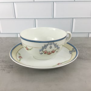 Noritake Tea Cup and Saucer  Pink Flowers Blue Scroll Pattern Gold Trim