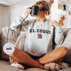 El Coqui sweatshirt, cozy graphic pullover, Puerto Rican pride, vintage style jumper, trendy casual wear, comfortable sweater