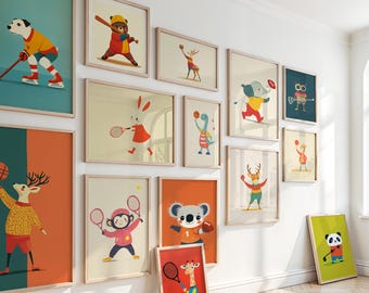 May include: A collection of framed art prints featuring cartoon animals engaged in various sports. The artwork includes a dog playing hockey, a bear batting, and a koala with a football. The color palette includes orange, green, and blue.