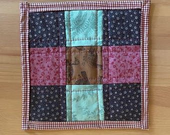 Tapis de tasse patchwork matelassé