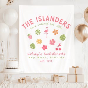 May include: White fabric banner with pink text that reads "THE ISLANDERS have entered the villa." The banner includes tropical illustrations and text that reads "Kelsey's Bachelorette Key West, Florida est 2025."