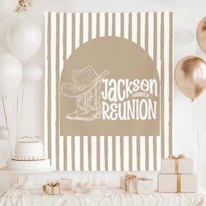 May include: A tan and white striped backdrop with the words "Jackson Family Reunion" in a script font. The design includes a cowboy hat and boots illustration. The scene is set for a celebration, with balloons, a cake, and wrapped gifts.