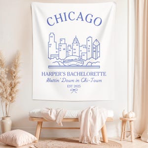 May include: White tapestry with a blue outline of the Chicago skyline, including the Bean sculpture. The text "CHICAGO" is at the top, and the text "HARPER'S BACHELORETTE Gettin' Down in Chi-Town EST 2025" is at the bottom.
