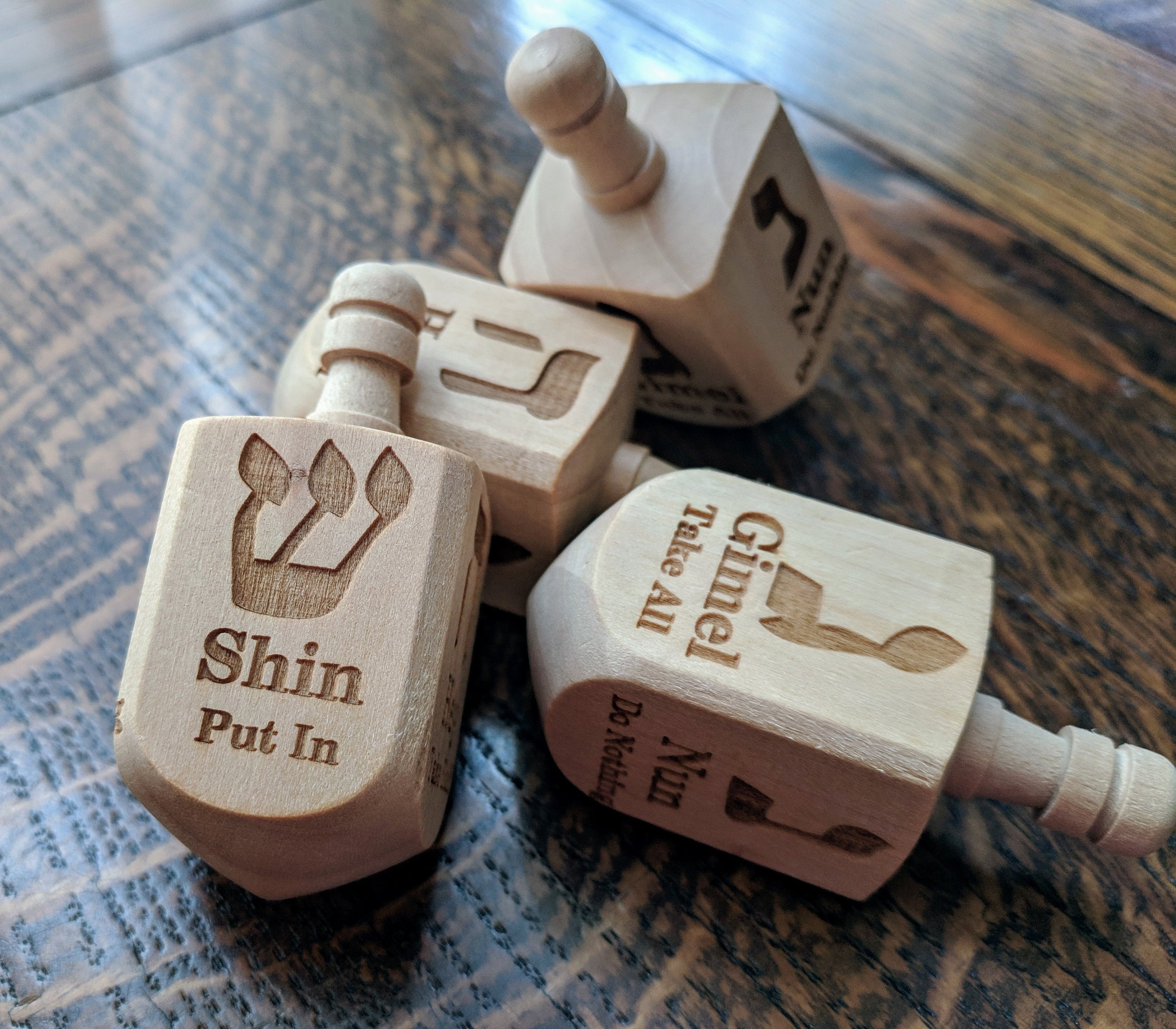 Wooden Dreidel Engraved with Hebrew and English Instructions