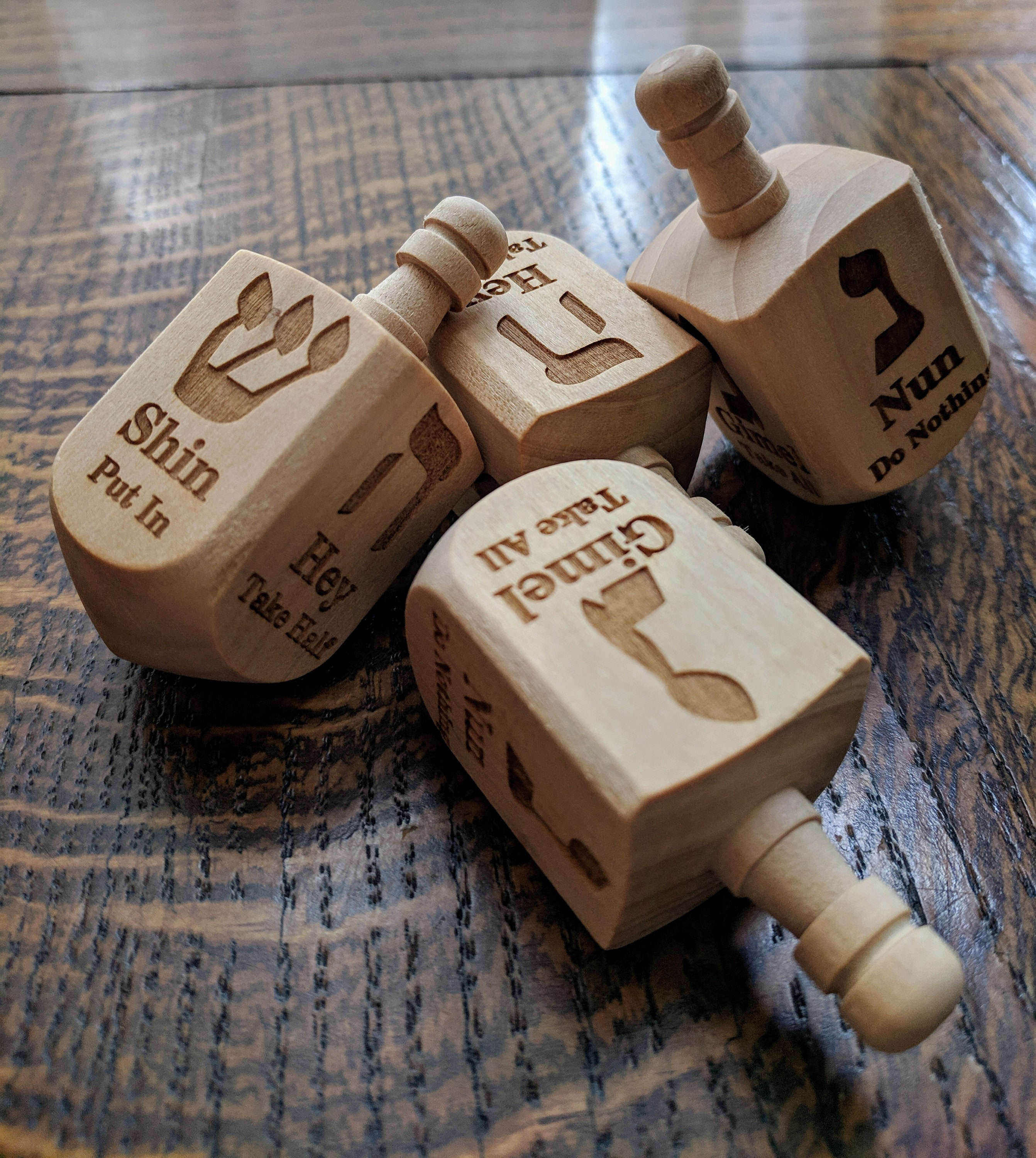 Wooden Dreidel Engraved with Hebrew and English Instructions