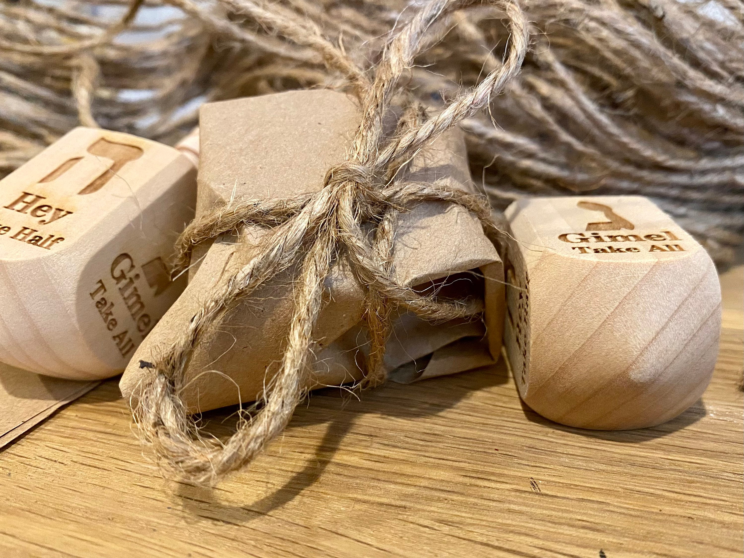 Wooden Dreidel Engraved with Hebrew and English Instructions