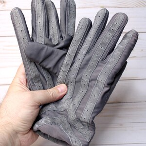 May include: A rustic wooden sign with the text "Welcome to our home" in white lettering. The sign has a distressed finish and a simple, inviting design, ideal for entryway decor.