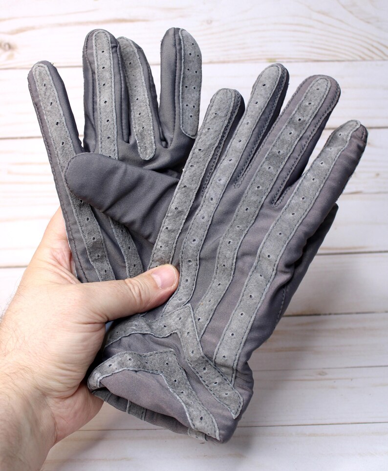 May include: A rustic wooden sign with the text "Welcome to our home" in white lettering. The sign has a distressed finish and a simple, inviting design, ideal for entryway decor.