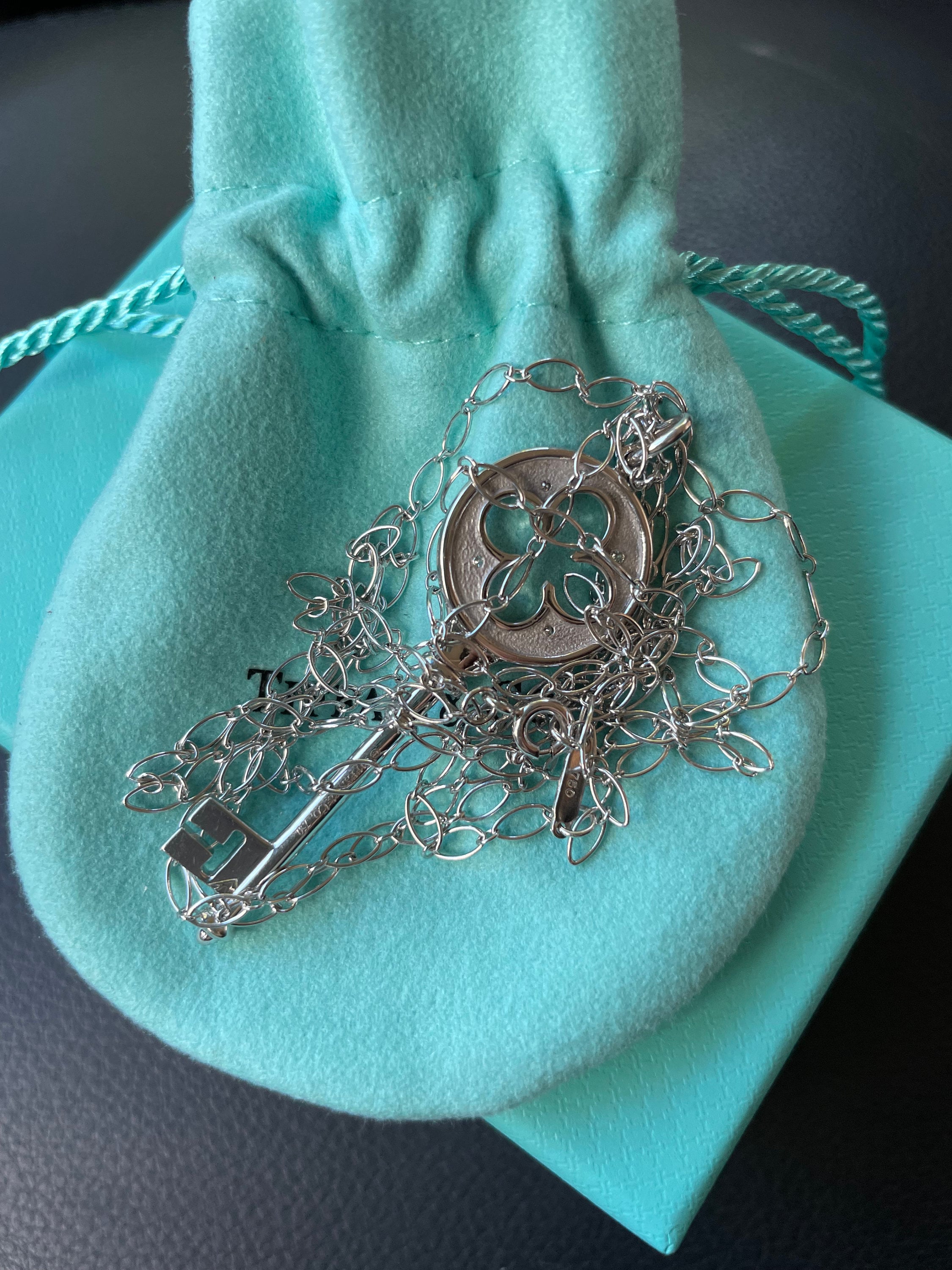 Tiffany Co. 18K White Gold 4 Diamond Quatrefoil Key Pendant and
