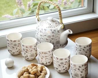 White Ceramic Tea Set with Delicate Floral Design and Woven Handle - 7-Piece Collection