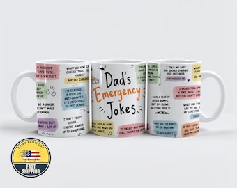 May include: A white ceramic mug featuring the text 'Dad's Emergency Jokes' in black and orange, surrounded by various colorful rectangular speech bubbles containing humorous puns and jokes written in black text, displayed in a set of three.