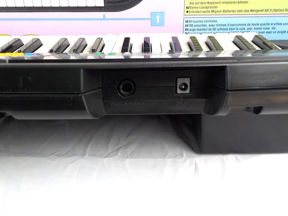 Casio CTK-330 49-key Keyboard Piano 100 Tones 50 Rhythms + Adapter