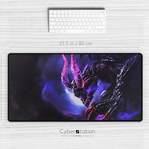 May include: A black rectangular mouse pad with a fantasy dragon design, measuring 31.5 inches by 15.5 inches. The dragon is primarily black with purple and pink accents. A white keyboard and mouse are also present.