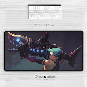 May include: A rectangular mouse pad featuring a character holding a mechanical shark-like weapon. The pad is 31.5 inches long and 15.5 inches wide. A white keyboard and mouse are also visible.