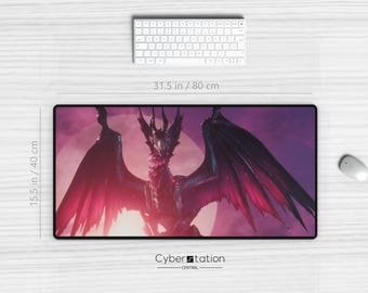 May include: A black and red dragon with large wings, a glowing moon in the background, and the text "Cyberstation Central" at the bottom of the image. This is a mousepad.