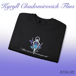May include: Black crew neck t-shirt with an embroidered design of a lantern, lightning bolts, and text. The text reads "Allow me to escort you out." The shirt also features the text "AVERLORE FAN MADE MERCH" at the bottom.
