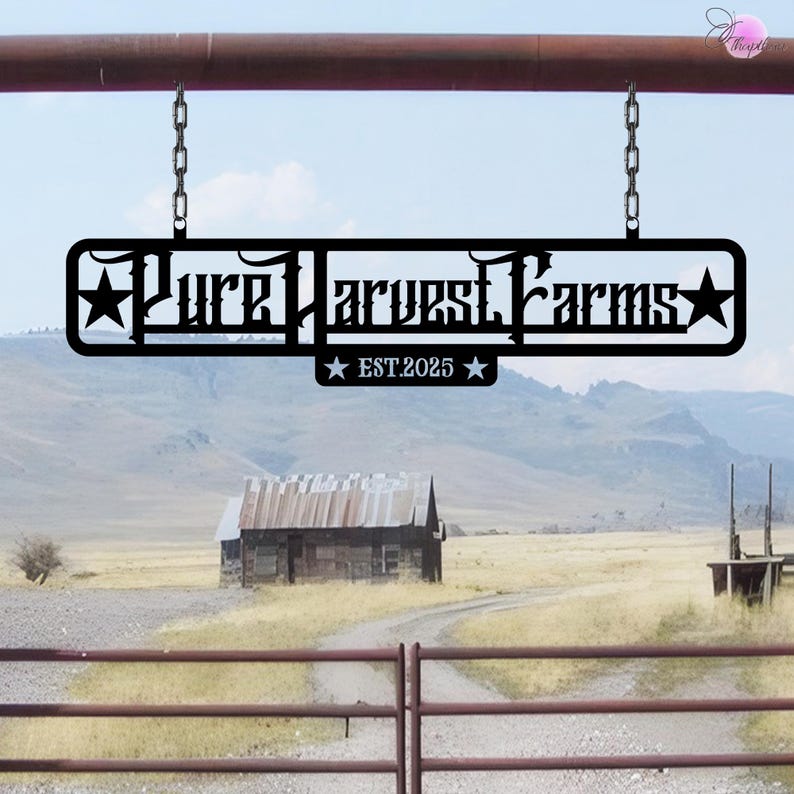 May include: Black metal sign with the text "Pure Harvest Farms" and "EST 2025" hanging from a chain on a metal beam. The sign is in front of a rural landscape with a wooden building in the distance.