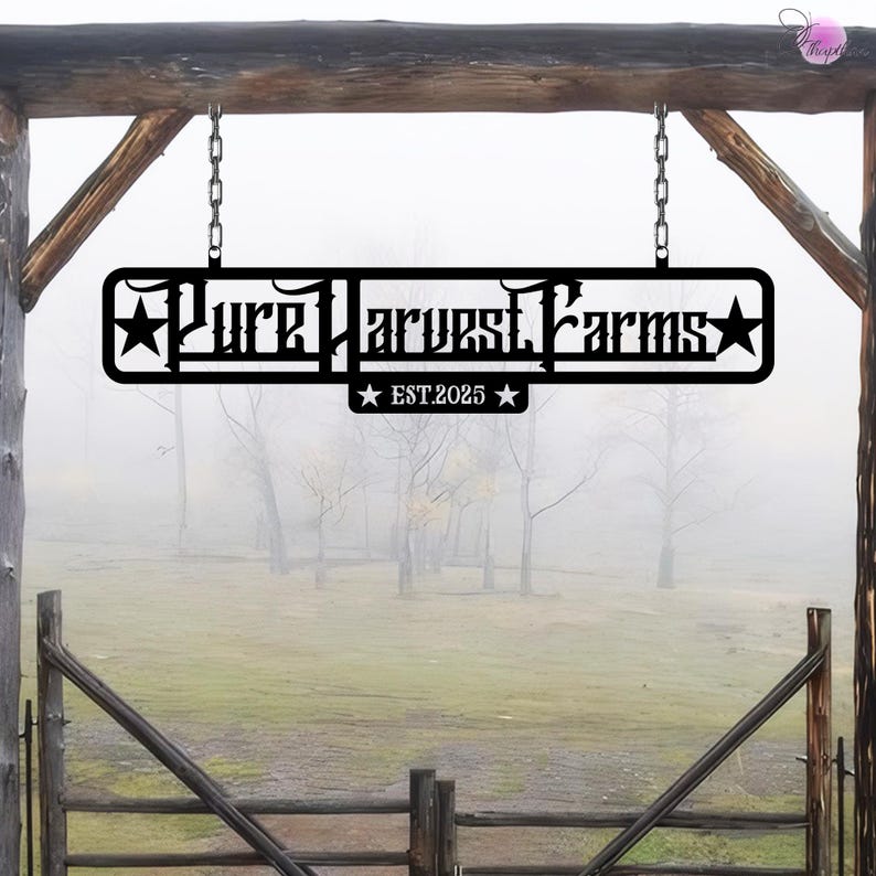 May include: Black metal sign with the text "Pure Harvest Farms" and "EST. 2025" hanging from a wooden structure. The sign is in front of a foggy field.