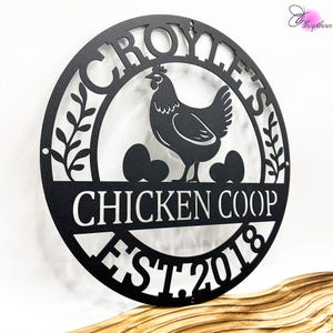 May include: Black metal sign with the text "Croyles Chicken Coop Est. 2018" and a silhouette of a hen and eggs.
