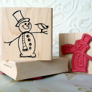 Tampon en caoutchouc bonhomme de neige avec un ami oiseau de oldislandstamps